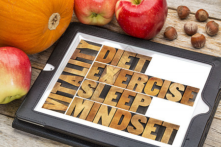 饮食 睡眠 运动和心态     活力桌子印版粮食坚果南瓜幸福凸版木头图片