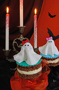 蛋糕上的鬼魂糕点庆典传统丁香甜点烛台午餐桌子派对烹饪图片