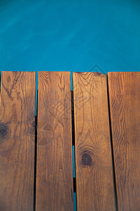 木林码头旅行晴天游客热带血管木头蓝色假期海岸线气候图片