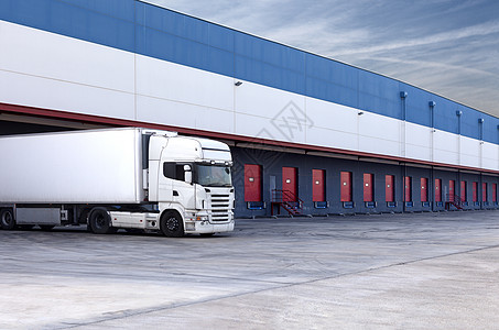 装货卡车商业后勤加载送货车辆阳光入口运输仓库货运图片