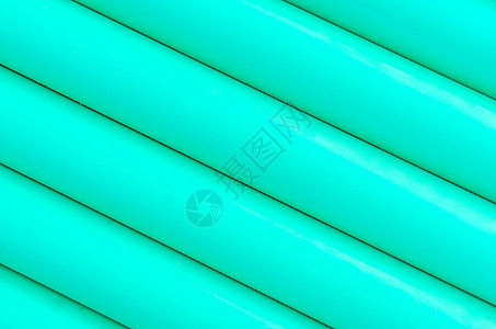 绿色塑料管状结构图案背景管子排水沟团体管道背景图片