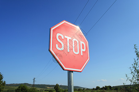 停止签名红色蓝色天空交通运输树木指示牌国家八角形图片