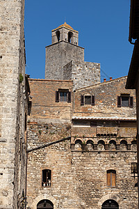 圣吉米尼那诺     图斯卡纳的中世纪小山镇 墙上围墙城堡观光历史天空窗户街道建筑百叶窗建筑学石头图片