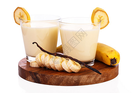 美味的香蕉奶昔饮料香草桌子托盘茶点奶油奶制品玻璃营养水果图片