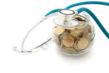 储蓄和财务概念中硬币的听觉镜金融医院诊所乐器投资生长卫生工资疾病经济图片