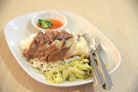 泰国菜食 带大米的斜猪腿蔬菜烹饪美味食物风情美食酱汁用餐菜单厨房图片