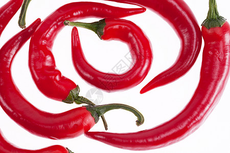 在白色背景上隔离的红椒粉辣椒烹饪营养蔬菜饮食沙拉红辣椒胡椒红色美食香料图片