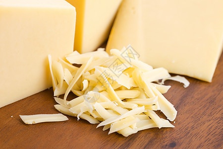 奶酪木头厨房熟食乳制品食物桌子木板橙子三角形饮食图片