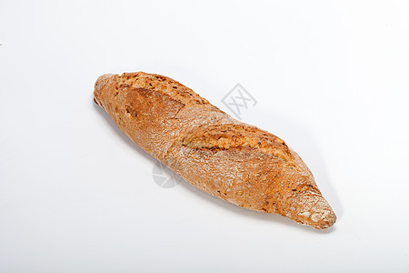 传统烤熟面包的大型小面包厨房宏观粮食脆皮乡村纤维美食耳朵植物静物图片