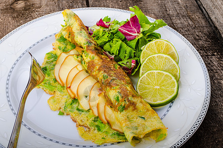 蔬菜扇菜煎蛋卷胡椒盘子美食生物洋葱辣椒文化香菜饮食草本植物图片