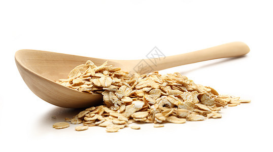 用木勺的滚燕麦谷物烹饪粮食营养燕麦碎粒种子白色食物图片