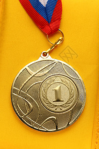 金属奖牌黄色蓝色运动徽章圆形竞赛白色荣誉丝带胜利图片