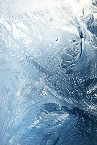 冰雪装饰蓝色宏观雪花季节磨砂窗户雾凇阴影玻璃天气图片