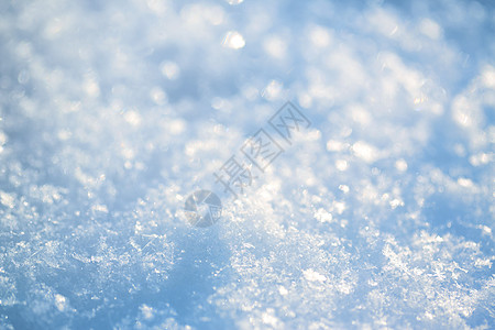 蓝色光纤雪背景空白季节水晶雪花蓝色阴影白色天气冻结火花背景