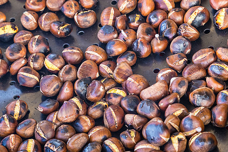 栗子棕色圆形食物市场季节摊位小吃美食季节性烧烤图片