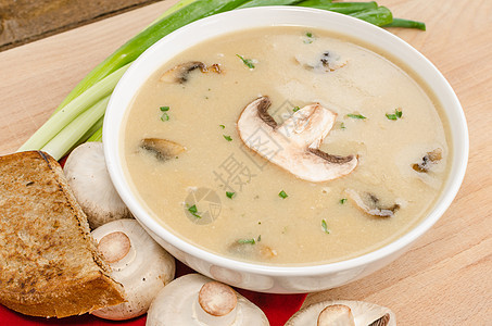 蘑菇汤蔬菜身体面包午餐食物胡椒土豆奶油勺子餐厅图片