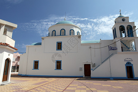 卡尔达梅纳度假胜地和科斯岛港口街道教堂蓝色主路立面建筑学地标白色城市图片
