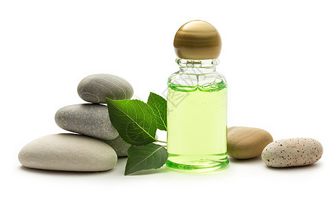 石头 叶子和洗发水瓶芳香洗发水黄色绿色浴室按摩文化瓶子治疗玻璃图片