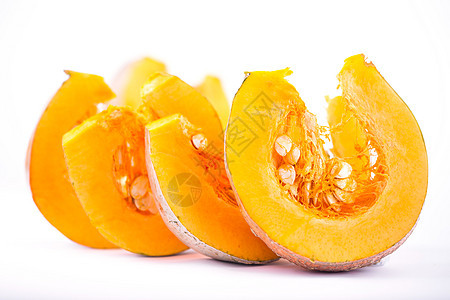 孤立的南瓜切片收成橙子季节营养黄色白色蔬菜种子葫芦食物图片