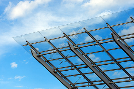 玻璃和钢铁大楼的建筑图案水平天花板蓝色城市建筑学金属窗户天空图片