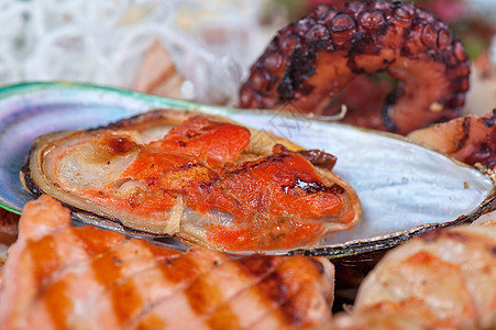 海鲜混合美食桌子贝类饮食餐厅海洋乌贼食物营养柠檬图片