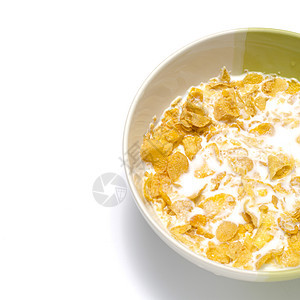玉米薄片玉米片谷物黄色白色工作室牛奶小吃液体粮食棕色图片