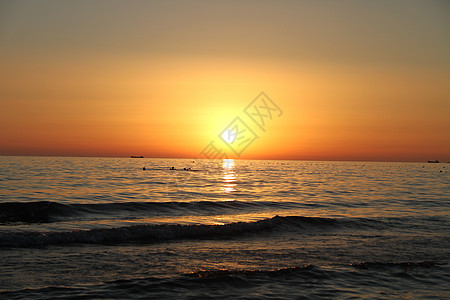 景色美丽 日落和海海洋阳光季节日出风景天空蓝色红色太阳海岸图片