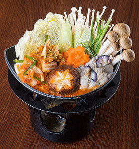 日式美食 背景的热锅洋葱食物螃蟹烹饪盘子蒸汽大豆海鲜豆腐饮食图片