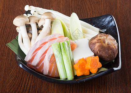 日式美食 背景的热锅海鲜面条烹饪蒸汽洋葱食物蔬菜大豆豆腐饮食图片