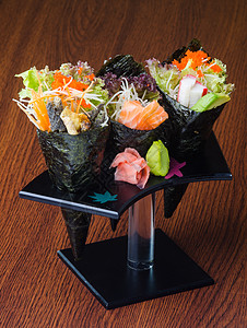 日美菜 背景的手卷章鱼情调海苔海藻盘子文化寿司白色海鲜异国图片