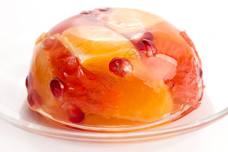 含柑橘水果的果冻糖食物浆果早餐橙子石榴盘子柠檬派对果味甜点图片