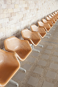 橙色塑料椅长椅地面竞技场民众座位椅子橙子建筑图片