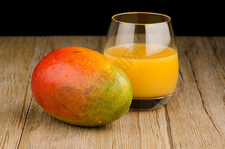 新鲜芒果汁服务甜点水壶液体水果热带情调果汁橙子黄色图片