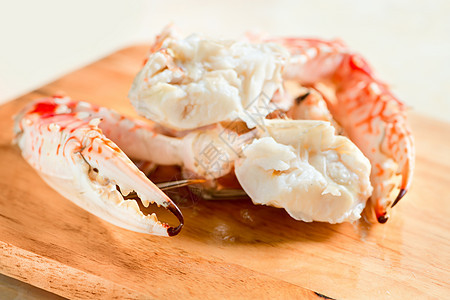 新鲜煮熟和盛装的螃蟹情调烹饪盘子动物异国热带裙子棕色荒野甲壳图片
