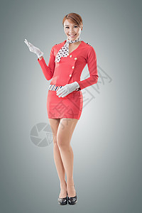 亚洲航空服务员手势飞机服务女性魅力姿势运输女士旅行航空公司背景图片