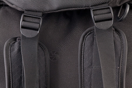 背包细节按钮口袋肩膀带子贮存旅行纺织品材料摄影尼龙图片