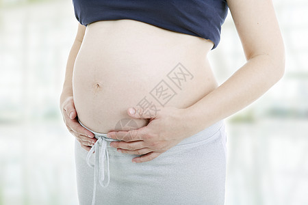 怀孕喜悦妻子保健女士亲热母亲身体成人生活卫生图片