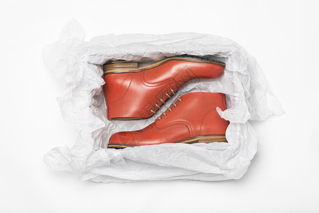 盒子中的新红色鞋子蕾丝店铺皮革高跟鞋包装鞋盒商业男性礼物购物图片