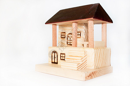 白色背景的木制房子孩子住宅剧场娃娃乐趣窗户红色小屋财产孩子们图片