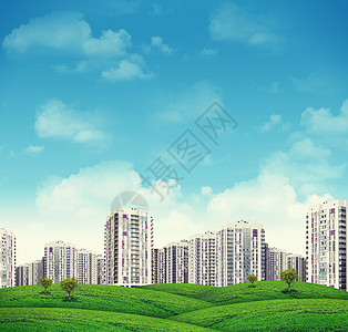 绿色山上高楼建筑绿色形状草地居住城市房子场地爬坡地面天空图片
