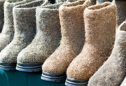由感觉制成的暖鞋脚靴羊毛商品衣服毛毡灰色棕色季节性橡皮图片