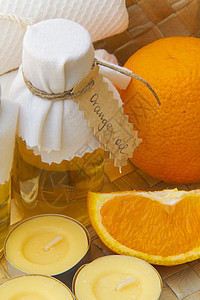 一瓶橙油清洁剂芳香健康瓶子香氛益处蜡烛抑郁编织居家背景图片