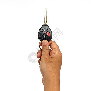 白色背景上孤立的手持车钥匙商业汽车女士贷款控制车辆安全图片