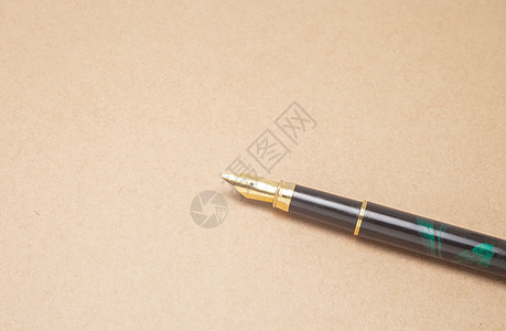 钢笔和手表青铜古董帆布圆珠笔金子框架铅笔羊皮纸材料笔尖图片