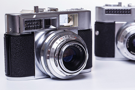 Retro相机黑色历史快门照片电影摄影师单反古董技术白色图片