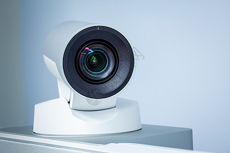 电话会议 电视会议或远程现场直播摄像头特写圆圈录影机视频临场感公司镜片人士相机商务技术图片