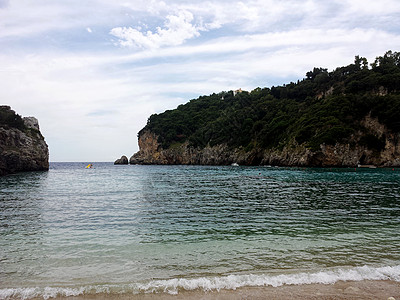 希腊科孚岛圣斯皮里顿湾气候植物热带游泳天空旅游海岸线游客假期阳光图片