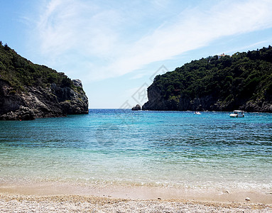 希腊科孚岛圣斯皮里顿湾假期气候海岸线场景蓝色旅行旅游天气环境植物图片