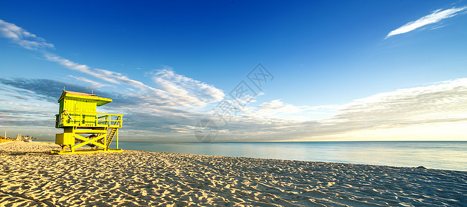 迈阿密南海滩日出天空救生塔地平线海洋日落橙子热带金子全景海滩图片