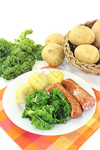 白叶烟熏土豆用餐市场盘子蔬菜食品香肠小便专业图片